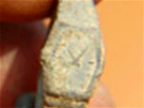 rolex watch found in tomb|ancient swiss watch found.